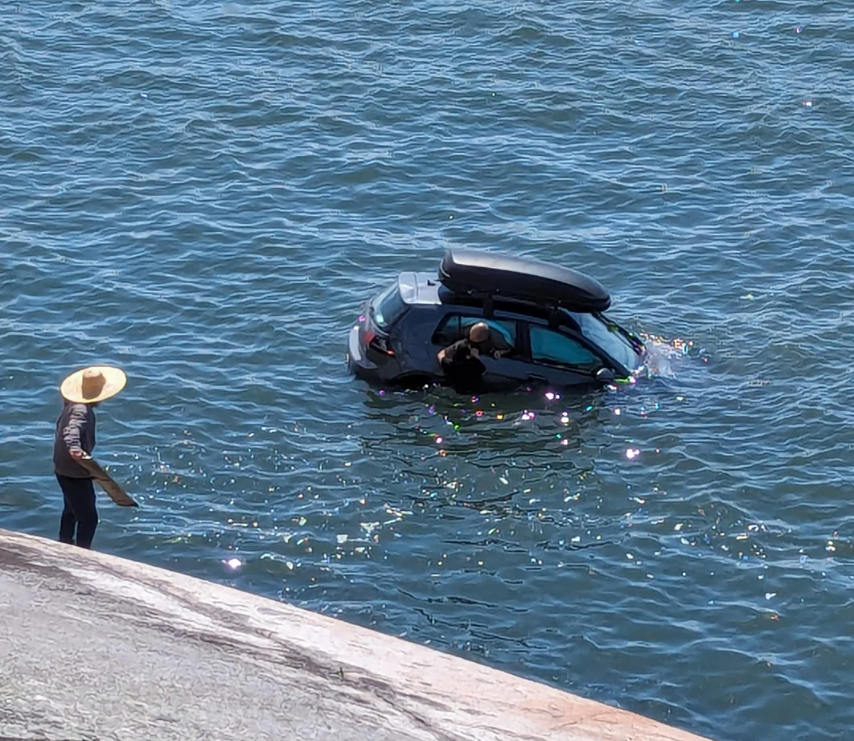 https://www.northshoredailypost.com/wp-content/uploads/2024/05/car-in-ocean.png