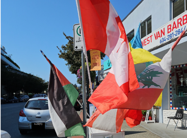 https://www.northshoredailypost.com/wp-content/uploads/2024/11/Flags-outside-barber-shop-in-West-600x443.png